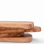 Stack of olive wood boards, made in Tunisia