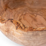 Closeup of the rustic edge of Wooden Bowl 