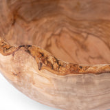 Closeup of the rustic edge of Wooden Bowl 