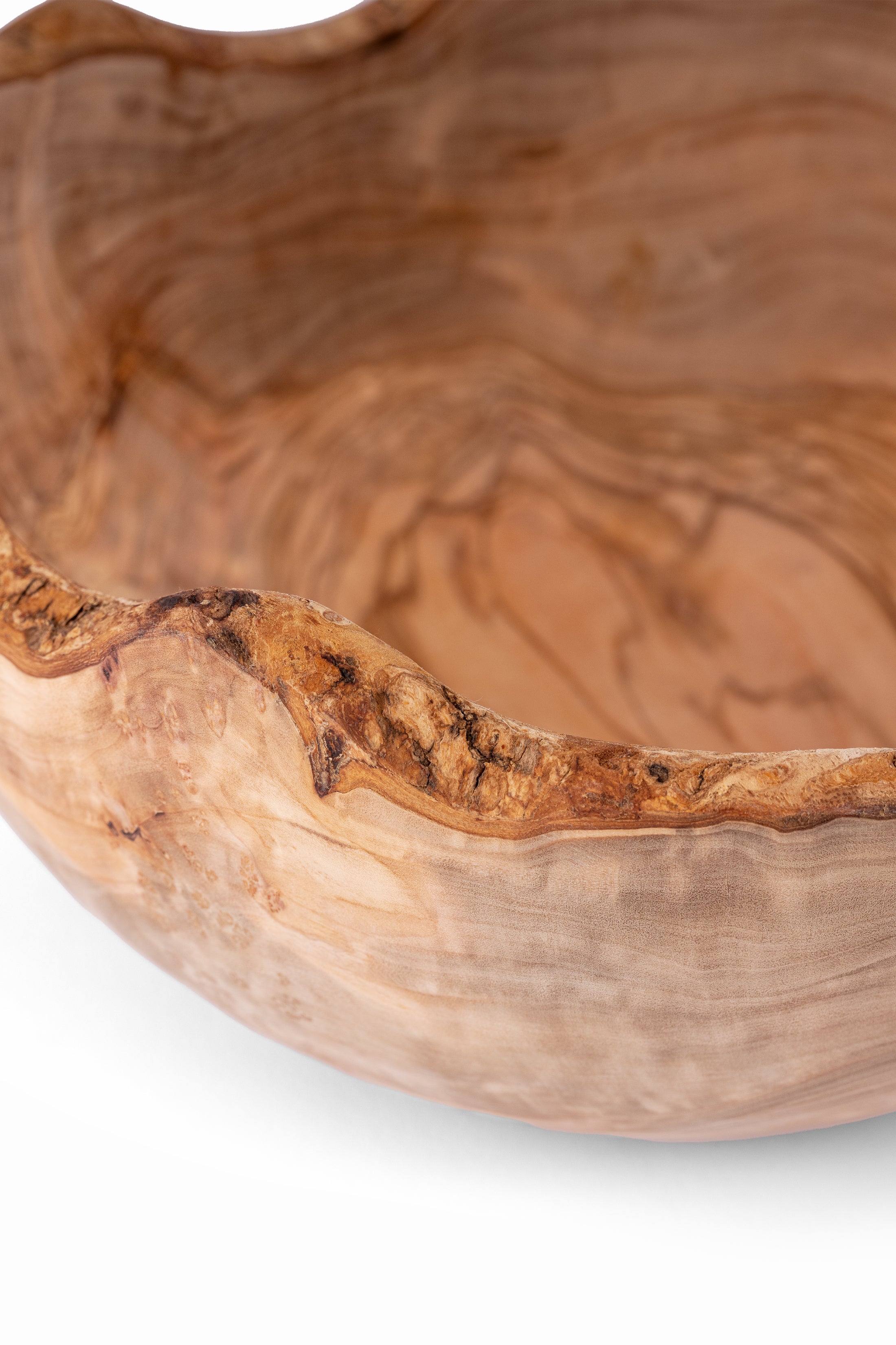 Closeup of the rustic edge of Wooden Bowl 