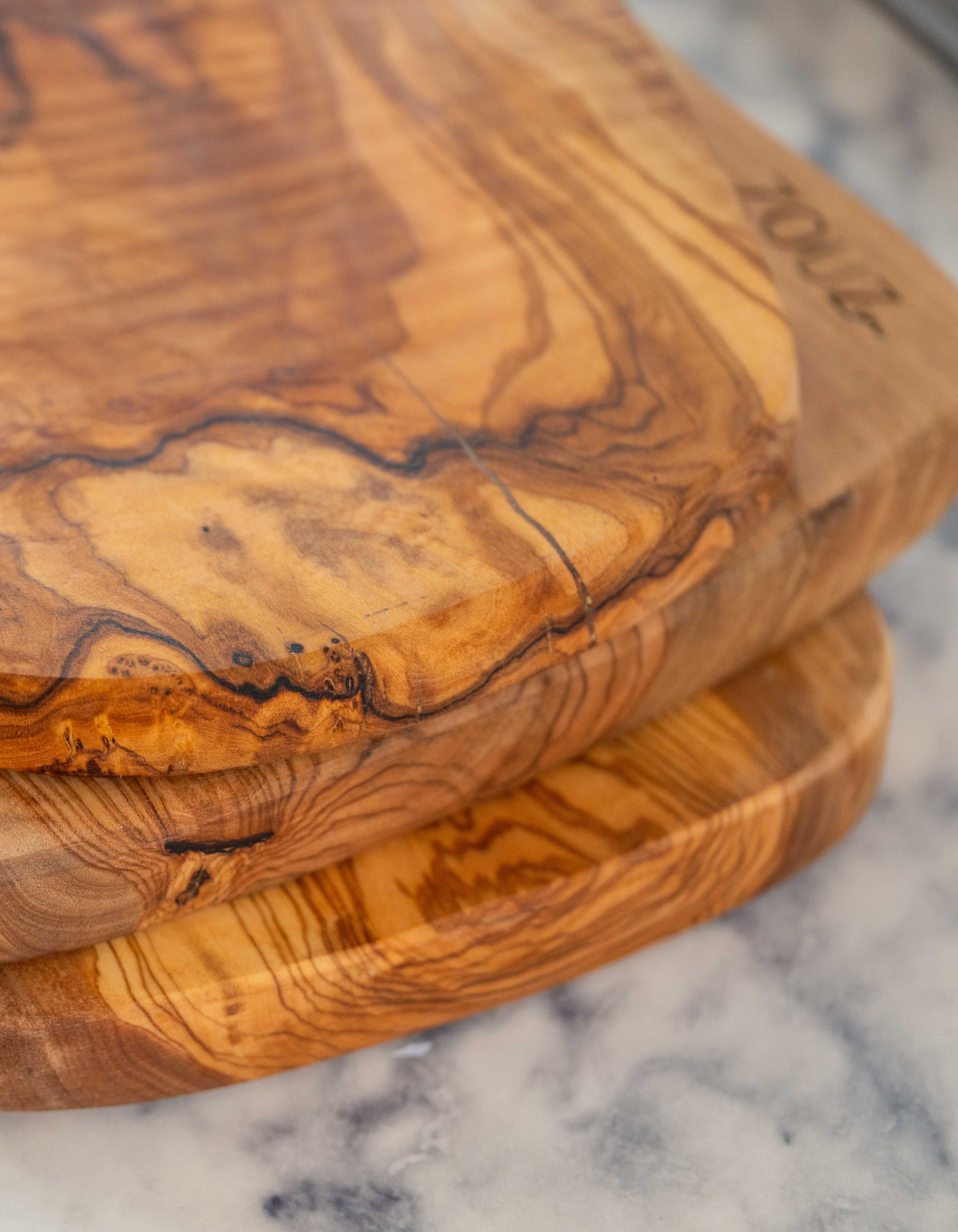 Closeup of a stack of ZOUZIN Oliwood Boards