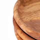 Close up detail of Dora olive wood plate