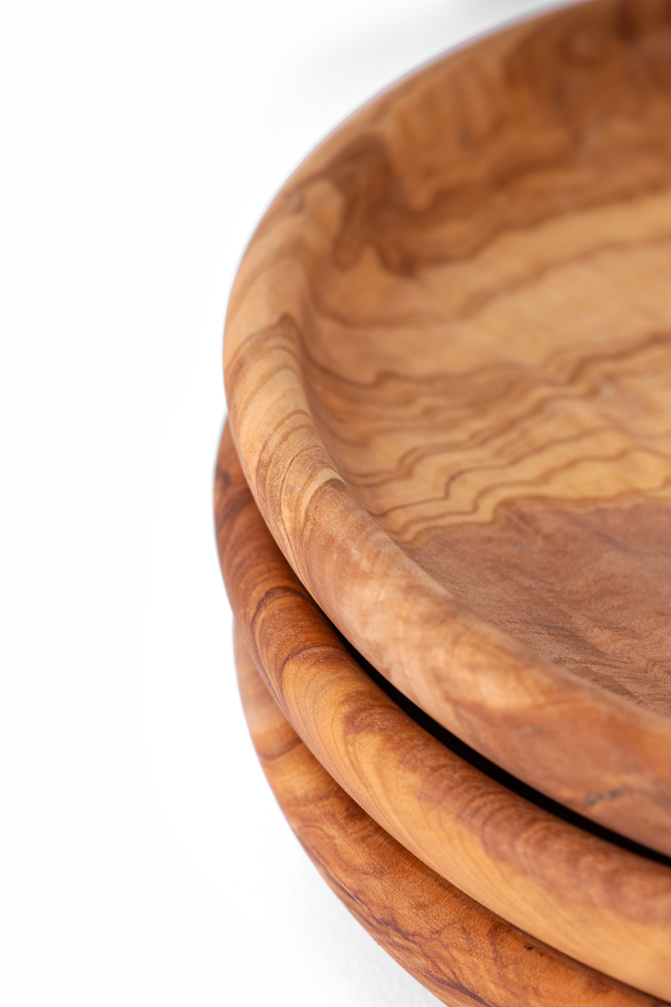 Close up detail of Dora olive wood plate